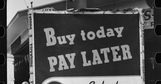 Sign saying buy today pay later from 100 years ago 